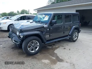 2022 Jeep Wrangler Unlimited Sahara Altitude z VIN 1C4HJXEG6NW103779, wystawiony jako IAAI lot #42563826 z przebiegiem 79 315 mil mil oraz . Historia ofert i sprzedaży dostępna na DreamBid. Obrazek 21.