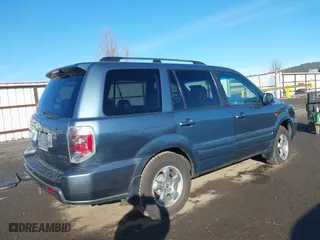2006 Honda Pilot EX-L with RES with VIN 2HKYF18666H511059, listed as a IAAI auction lot 41719613 with 143,084 mi miles. Bid and sale history available at carsss.com. Image 4.