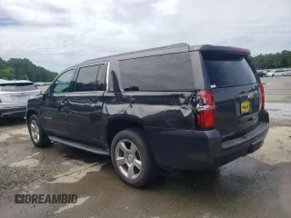 2016 Chevrolet Suburban LT with VIN 1GNSCHKC3GR312221, listed as a Copart auction lot 57445934 with 157,958 mi miles and Salvage Title. Bid and sale history available at carsss.com. Image 2.