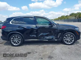 2019 BMW X5 xDrive40i with VIN 5UXCR6C59KLL23735, listed as a IAAI auction lot 41999791 with 31,072 mi miles. Bid and sale history available at carsss.com. Image 13.