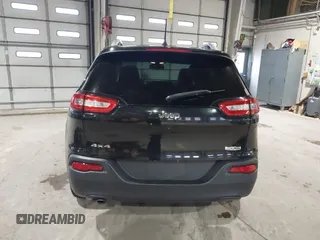 2015 Jeep Cherokee Latitude with VIN 1C4PJMCB5FW768854, listed as a IAAI auction lot 41246213 with 131,112 mi miles. Bid and sale history available at carsss.com. Image 16.