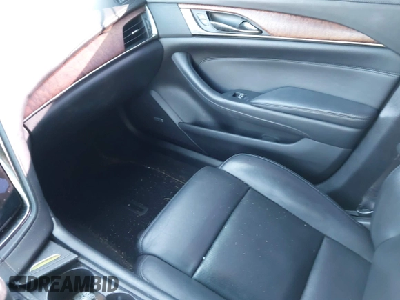 2019 Cadillac CTS Luxury AWD z VIN 1G6AX5SX8K0129858, wystawiony jako IAAI lot #41778164 z przebiegiem 89 695 mil mil oraz . Historia ofert i sprzedaży dostępna na DreamBid. Obrazek 5.