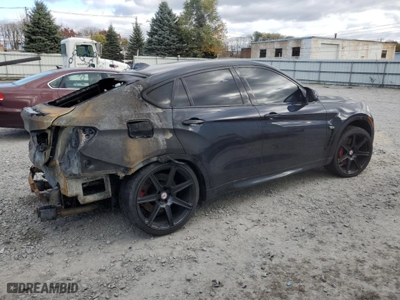 2015 BMW X6 M with VIN 5YMKW8C54F0G93980, listed as a Copart auction lot 79633994 with NaN miles and Salvage Title. Bid and sale history available at carsss.com. Image 3.