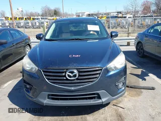 2016 Mazda CX-5 Touring with VIN JM3KE4CY0G0631786, listed as a IAAI auction lot 41761214 with 220,058 mi miles. Bid and sale history available at carsss.com. Image 12.