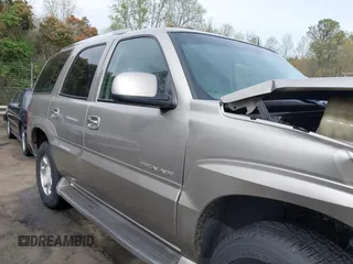 2002 Cadillac Escalade z VIN 1GYEK63N02R131870, wystawiony jako IAAI lot #41889300 z przebiegiem 328 013 mil mil oraz . Historia ofert i sprzedaży dostępna na DreamBid. Obrazek 13.