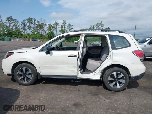 2018 Subaru Forester z VIN JF2SJABC5JH444739, wystawiony jako IAAI lot #42123918 z przebiegiem 124 520 mil mil oraz . Historia ofert i sprzedaży dostępna na DreamBid. Obrazek 15.
