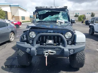 2014 Jeep Wrangler Unlimited Rubicon with VIN 1C4BJWFGXEL172622, listed as a IAAI auction lot 41782796 with 67,594 mi miles. Bid and sale history available at carsss.com. Image 13.