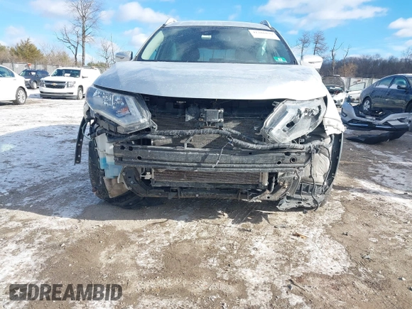 2018 Nissan Rogue S with VIN 5N1AT2MT2JC738034, listed as a IAAI auction lot 41286839 with 125,037 mi miles and . Bid and sale history available at DreamBid. Image 6.