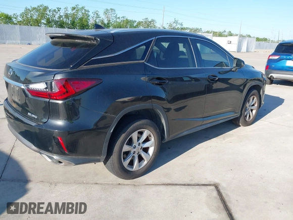 2016 Lexus RX 350 with VIN 2T2ZZMCA9GC012233, listed as a IAAI auction lot 41974549 with 84,960 mi miles and . Bid and sale history available at DreamBid. Image 4.
