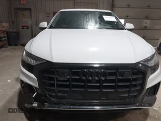 2021 Audi Q8 Premium Plus z VIN WA1EVAF11MD013975, wystawiony jako IAAI lot #41380207 z przebiegiem 77 979 mil mil oraz . Historia ofert i sprzedaży dostępna na DreamBid. Obrazek 12.