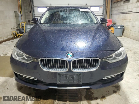 2013 BMW 3 Series 328i xDrive with VIN WBA3B3C57DF537268, listed as a Copart auction lot 57885985 with 122,050 mi miles and Salvage title. Bid and sale history available at DreamBid. Image 5.