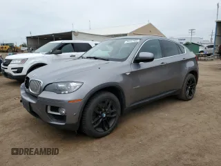 2014 BMW X6 50i z VIN 5UXFG8C59EL592398, wystawiony jako Copart lot #59347905 z przebiegiem 173 941 mil mil oraz Czysty tytuł • Clean title. Historia ofert i sprzedaży dostępna na DreamBid. Obrazek 1.