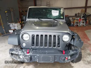 2017 Jeep Wrangler Unlimited Rubicon Recon z VIN 1C4BJWFG5HL687757, wystawiony jako IAAI lot #42367095 z przebiegiem 48 441 mil mil oraz . Historia ofert i sprzedaży dostępna na DreamBid. Obrazek 12.