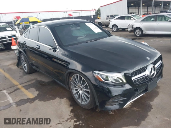 2019 Mercedes-Benz GLC 300 with VIN WDC0J4KB0KF667213, listed as a IAAI auction lot 40422288 with 56,488 mi miles and . Bid and sale history available at DreamBid. Image 1.