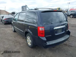 2010 Dodge Grand Caravan SXT with VIN 2D4RN5D13AR426980, listed as a IAAI auction lot 42035672 with 162,584 mi miles and . Bid and sale history available at DreamBid. Image 3.