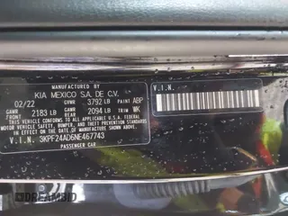 2022 Kia Forte LXS with VIN 3KPF24AD6NE467743, listed as a IAAI auction lot 42019354 with 36,496 mi miles and . Bid and sale history available at DreamBid. Image 9.