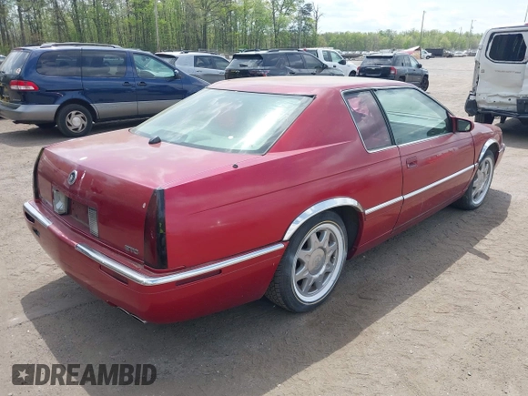 1997 Cadillac Eldorado Touring ETC z VIN 1G6ET1297VU600449, wystawiony jako IAAI lot #42096992 z przebiegiem 185 918 mil mil oraz . Historia ofert i sprzedaży dostępna na DreamBid. Obrazek 4.