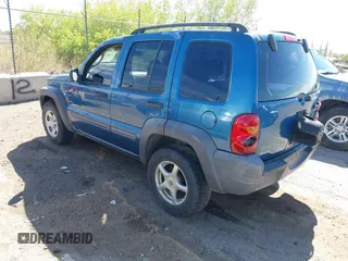 2003 Jeep Liberty Sport with VIN 1J4GL48K03W569834, listed as a IAAI auction lot 42061973 with 278,475 mi miles. Bid and sale history available at carsss.com. Image 3.