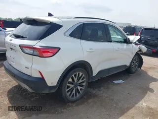 2020 Ford Escape Titanium Hybrid with VIN 1FMCU0DZ9LUA54867, listed as a IAAI auction lot 42268245 with 68,974 mi miles and . Bid and sale history available at DreamBid. Image 4.