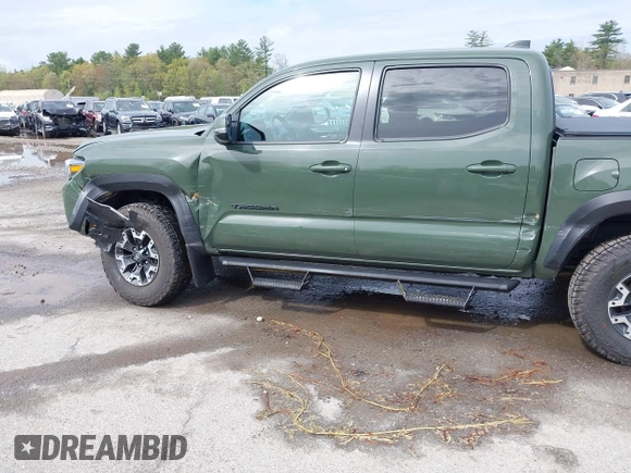 2021 Toyota Tacoma SR with VIN 3TMCZ5AN5MM380286, listed as a IAAI auction lot 42165523 with 58,965 mi miles and . Bid and sale history available at DreamBid. Image 6.