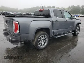 2022 GMC Canyon 4WD Denali with VIN 1GTG6EEN0N1147922, listed as a Copart auction lot 54143435 with 68,650 mi miles and Salvage title. Bid and sale history available at DreamBid. Image 3.