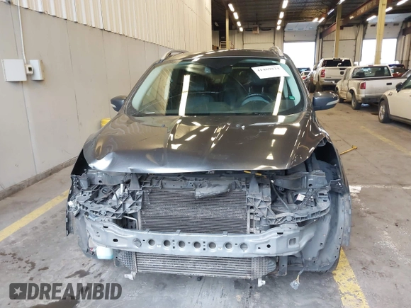 2016 Ford Escape Titanium with VIN 1FMCU9J92GUB63525, listed as a IAAI auction lot 41469824 with 156,773 mi miles. Bid and sale history available at carsss.com. Image 12.