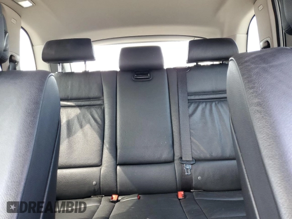 2012 BMW X5 35i with VIN 5UXZV4C59CL752661, listed as a Copart auction lot 58590305 with 101,725 mi miles and Salvage title. Bid and sale history available at DreamBid. Image 10.