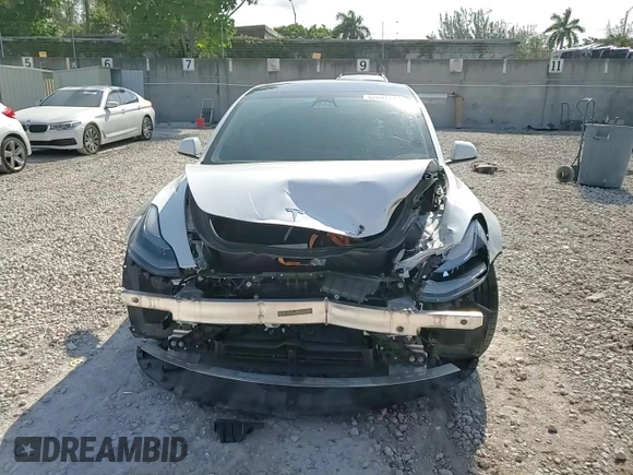 2023 Tesla Model 3 with VIN 5YJ3E1EA6PF510323, listed as a Copart auction lot 52094495 with 115,928 mi miles and Salvage Title. Bid and sale history available at DreamBid. Image 14.