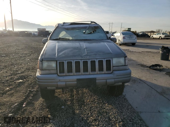 1998 Jeep Grand Cherokee Limited с VIN 1J4GZ78Y0WC260231, выставлен на аукционе Copart как лот 85149724 с пробегом 203 258 миль миль и Списание • Salvage title. История ставок и продаж доступна на DreamBid. Изображение 5.