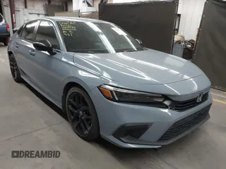 2023 Honda Civic Sport z VIN 2HGFE2F51PH504042, wystawiony jako IAAI lot #42148715 z przebiegiem 52 662 mil mil oraz . Historia ofert i sprzedaży dostępna na DreamBid. Obrazek 1.