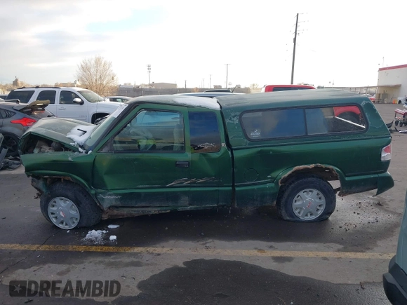 1997 GMC Sonoma SLS with VIN 1GTDT19X0V8502966, listed as a IAAI auction lot 41331331 with 308,584 mi miles. Bid and sale history available at carsss.com. Image 13.