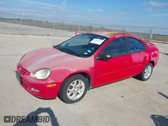 2002 Dodge Neon SXT with VIN 1B3ES56C02D627244, listed as a IAAI auction lot 41047832 with 65,827 mi miles. Bid and sale history available at carsss.com. Image 2.