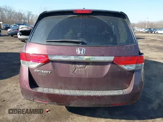 2014 Honda Odyssey EX-L with VIN 5FNRL5H60EB009083, listed as a IAAI auction lot 41633419 with 219,930 mi miles and . Bid and sale history available at carsss.com. Image 16.