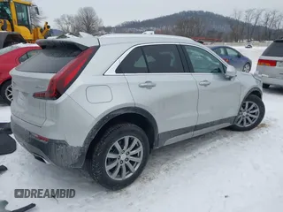 2019 Cadillac XT4 FWD Premium Luxury with VIN 1GYFZCR42KF223397, listed as a IAAI auction lot 41308551 with 20,575 mi miles. Bid and sale history available at carsss.com. Image 4.