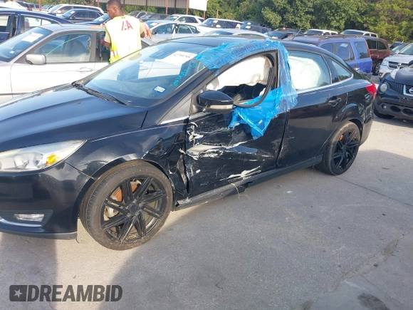 2016 Ford Focus Titanium with VIN 1FADP3J26GL335843, listed as a IAAI auction lot 42799795 with 167,506 mi miles and . Bid and sale history available at DreamBid. Image 6.