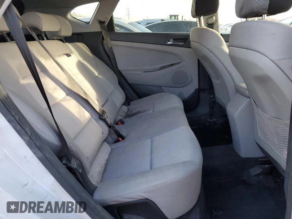 2018 Hyundai Tucson SE z VIN KM8J2CA41JU667909, wystawiony jako Copart lot #49583005 z przebiegiem Nie podano mil oraz Szkody całkowita. Historia ofert i sprzedaży dostępna na DreamBid. Obrazek 11.