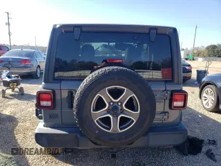 2020 Jeep Wrangler Willys with VIN 1C4GJXAG5LW307083, listed as a Copart auction lot 86994744 with 28,873 mi miles and Salvage title. Bid and sale history available at DreamBid. Image 6.