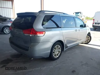 2013 Toyota Sienna XLE AAS with VIN 5TDYK3DC3DS297044, listed as a IAAI auction lot 42552470 with 143,947 mi miles and . Bid and sale history available at DreamBid. Image 4.