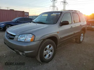 2002 Mazda Tribute LX with VIN 4F2YU09142KM22895, listed as a Copart auction lot 73797364 with 176,514 mi miles and Salvage Title. Bid and sale history available at carsss.com. Image 1.