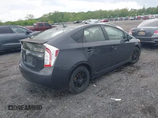 2013 Toyota Prius One with VIN JTDKN3DU8D1716993, listed as a IAAI auction lot 42202519 with 182,421 mi miles and . Bid and sale history available at DreamBid. Image 4.