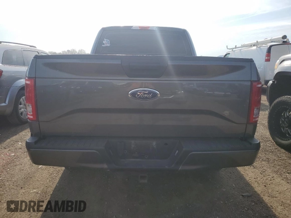 2015 Ford F-150 XLT with VIN 1FTEX1EP1FKE99188, listed as a Copart auction lot 54117115 with 201,077 mi miles and Salvage title. Bid and sale history available at DreamBid. Image 6.