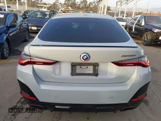2023 BMW 4 Series M440i with VIN WBA63AW02PFN40551, listed as a IAAI auction lot 41230910 with 23,526 mi miles and . Bid and sale history available at DreamBid. Image 16.