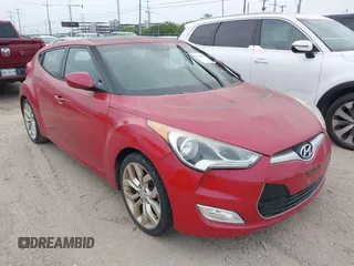 2013 Hyundai Veloster w/Gray Int with VIN KMHTC6AD2DU141462, listed as a IAAI auction lot 42136445 with 122,146 mi miles and . Bid and sale history available at DreamBid. Image 1.