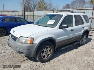 2004 Ford Escape XLT with VIN 1FMYU93164KA96674, listed as a IAAI auction lot 41780474 with 182,525 mi miles. Bid and sale history available at carsss.com. Image 17.