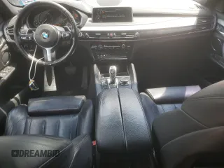 2015 BMW X6 xDrive35i z VIN 5UXKU2C58F0N77513, wystawiony jako Copart lot #55859345 z przebiegiem 82 560 mil mil oraz Szkoda całkowita • Salvage title. Historia ofert i sprzedaży dostępna na DreamBid. Obrazek 8.
