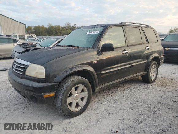 2001 Suzuki XL7 Standard z VIN JS3TX92V514102993, wystawiony jako Copart lot #76669614 z przebiegiem 65 789 mil mil oraz Szkoda całkowita • Salvage title. Historia ofert i sprzedaży dostępna na DreamBid. Obrazek 1.