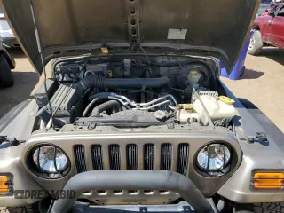 2004 Jeep Wrangler Rubicon with VIN 1J4FA69S64P751349, listed as a Copart auction lot 69642624 with 160,589 mi miles and Salvage Title. Bid and sale history available at carsss.com. Image 11.