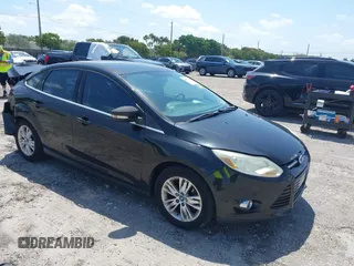 2012 Ford Focus SEL with VIN 1FAHP3H22CL146186, listed as a IAAI auction lot 41977207 with 127,396 mi miles. Bid and sale history available at carsss.com. Image 1.