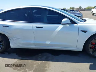 2023 Tesla Model 3 Performance z VIN 5YJ3E1EC7PF432748, wystawiony jako IAAI lot #41841913 z przebiegiem 36 043 mil mil oraz . Historia ofert i sprzedaży dostępna na DreamBid. Obrazek 13.