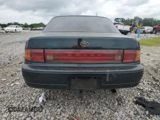 1993 Toyota Camry LE with VIN 4T1SK12E9PU300183, listed as a Copart auction lot 74661684 with 287,662 mi miles and Salvage Title. Bid and sale history available at carsss.com. Image 6.